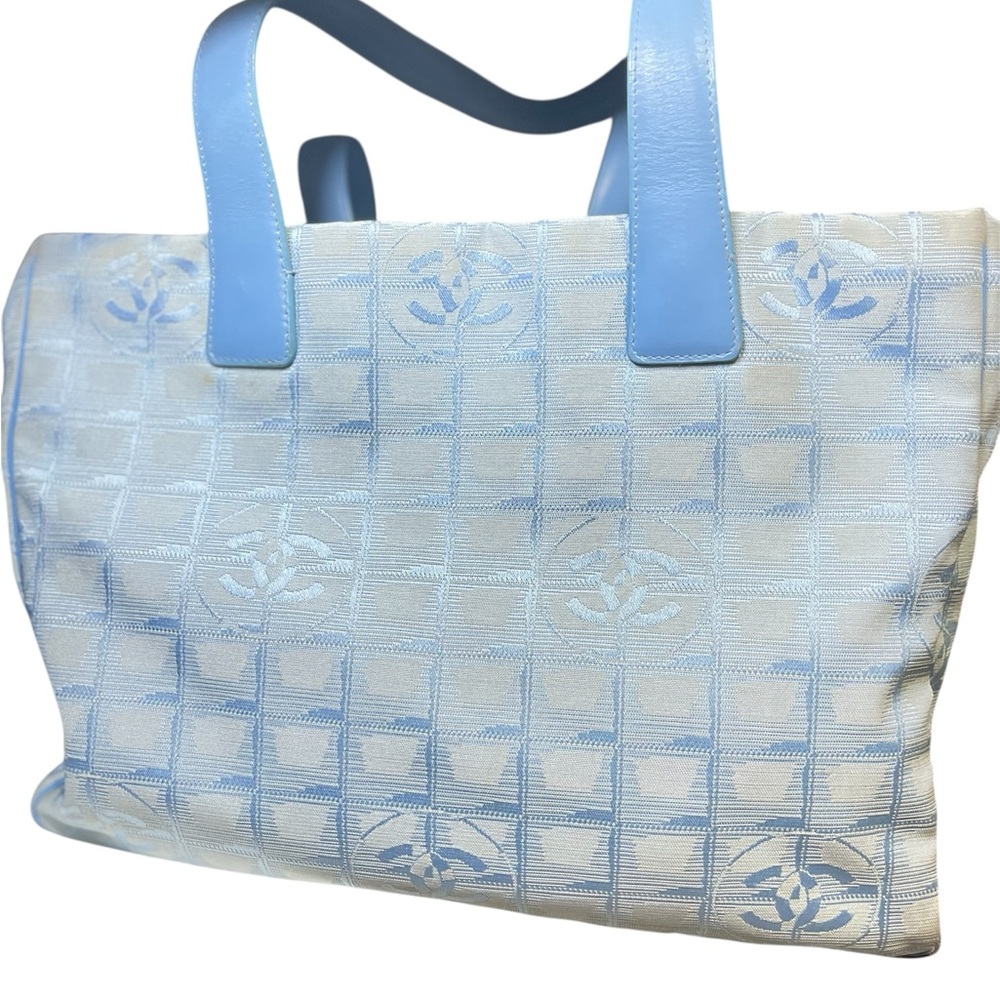 Chanel Travel line Tote in light blue with authenticity Card